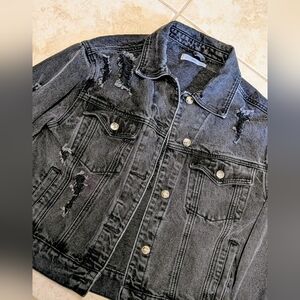 Black tattered jean jacket